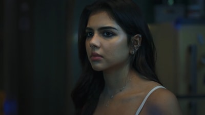 Kalyani Priyadarshan in a still from Lokah. Kalyani Priyadarshan in a still from Lokah.