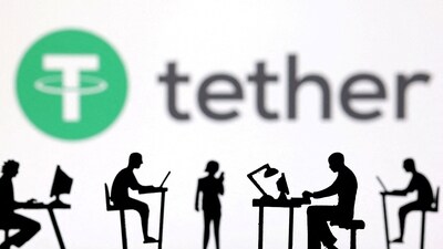Figurines with computers and smartphones are seen in front of Tether logo in this illustration taken (REUTERS) Figurines with computers and smartphones are seen in front of Tether logo in this illustration taken (REUTERS)