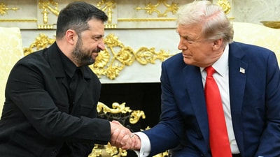 Ukrainian President Volodymyr Zelensky and President Trump shake hands in the Oval Office earlier this month.