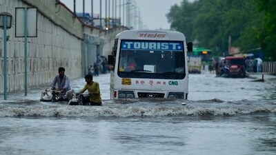 Areas near the Yamuna river, such as Vinod nagar in east Delhi near National Highway 24, were also inundated due to heavy rain, slowing the traffic down across the city.&nbsp; (Raj K Raj/HT Photo)