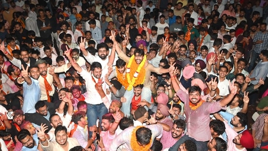 ABVP's Gaurav Veer Sohal and his supporters celebrate after winning the student council election at Panjab University in Chandigarh on Wednesday, September 3. (Keshav Singh/HT Photo)