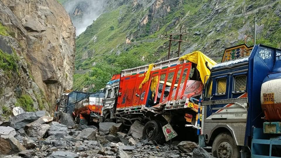 Trucks that were damaged when hit by boulders during a landslide at Wangtu in Kinnaur district on Wednesday. (HT Photo) Trucks that were damaged when hit by boulders during a landslide at Wangtu in Kinnaur district on Wednesday. (HT Photo)