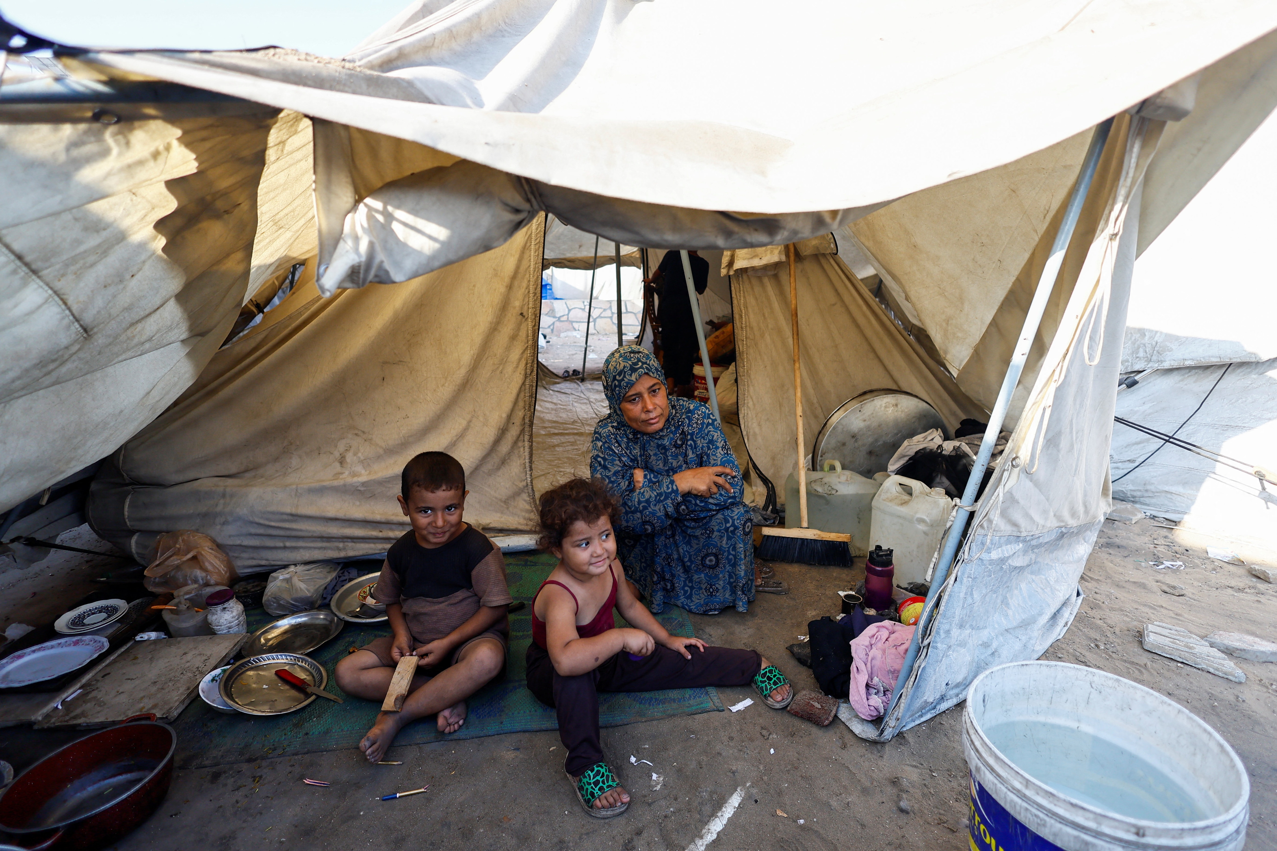 Palestinians displaced by the Israeli military offensive take shelter in a tent camp, as Israeli forces escalate operations around Gaza City, in Gaza City, September 3, 2025. (Mahmoud Issa/REUTERS)