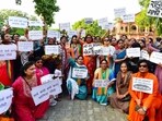 BJP women wing supporters in Dehradun holding placards protest over alleged remarks about PM Modi and his late mother during Congress's 'Voter Adhikar Yatra' in Bihar BJP women wing supporters in Dehradun holding placards protest over alleged remarks about PM Modi and his late mother during Congress's 'Voter Adhikar Yatra' in Bihar