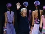 Italian designer Giorgio Armani waves from the runway of the Emporio Armani fashion show during the Milan Fashion Week Womenswear Spring/Summer 2024 on September 21, 2023 in Milan. Italian fashion great Giorgio Armani has died at the age of 91 "surrounded by his loved ones", his company said on September 4, 2025.