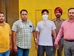 The accused after his arrest by vigilance officials in Ludhiana on Thursday. (HT Photo) The accused after his arrest by vigilance officials in Ludhiana on Thursday. (HT Photo)