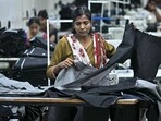 A woman working at a textile unit in India
