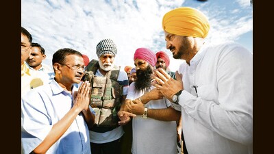 AAP national convener Arvind Kejriwal interacting with affected farmers in Kapurthala’s Sultanpur Lodhi on Thursday. (HT) AAP national convener Arvind Kejriwal interacting with affected farmers in Kapurthala’s Sultanpur Lodhi on Thursday. (HT)