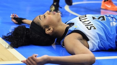 Angel Reese #5 of the Chicago Sky collects herself after being fouled during the first half against the Connecticut Sun (Getty Images via AFP) Angel Reese #5 of the Chicago Sky collects herself after being fouled during the first half against the Connecticut Sun (Getty Images via AFP)