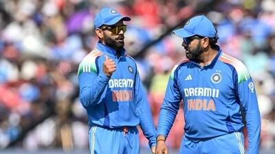 India's Virat Kohli (L) speaks with his ODI captain Rohit Sharma (AFP) India's Virat Kohli (L) speaks with his ODI captain Rohit Sharma (AFP)