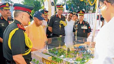Chief minister Yogi Adityanath along with Chief of Defence Staff (CDS) General Anil Chauhan (extreme left), reviews the proposed model of Gorkha Museum in Gorakhpur on Thursday. (HT) Chief minister Yogi Adityanath along with Chief of Defence Staff (CDS) General Anil Chauhan (extreme left), reviews the proposed model of Gorkha Museum in Gorakhpur on Thursday. (HT)