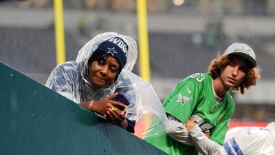 A Dallas Cowboys fan and a Philadelphia Eagles fan peer down at a tunnel as the teams prepare to jog onto the field before an NFL football game Thursday, Sept. 4, 2025, in Philadelphia. (AP) A Dallas Cowboys fan and a Philadelphia Eagles fan peer down at a tunnel as the teams prepare to jog onto the field before an NFL football game Thursday, Sept. 4, 2025, in Philadelphia. (AP)