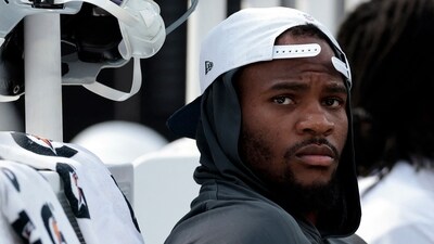 Micah Parsons sits on the sidelines. (Getty Images via AFP) Micah Parsons sits on the sidelines. (Getty Images via AFP)