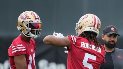 San Francisco 49ers wide receiver Jauan Jennings (15) talks with wide receiver Demarcus Robinson (5) (AP) San Francisco 49ers wide receiver Jauan Jennings (15) talks with wide receiver Demarcus Robinson (5) (AP)