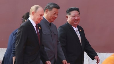 Russian President Vladimir Putin (L) and North Korean leader Kim Jong Un (R) were seen with China's Xi Jinping at the military parade in Beijing. (PTI)
