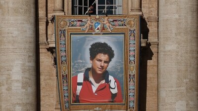 Carlo Acutis, who died aged 15, learned computer code to build websites to spread his faith. (REUTERS)