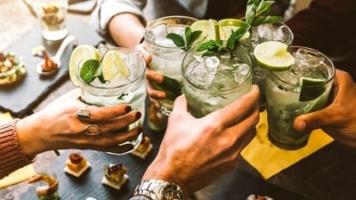 A simple gesture drew cheers from the Kannadigas, who welcomed the newcomer to their table, ordered shots, and even paid for his drinks. (Representational Image) (Shutterstock)