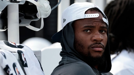 Micah Parsons sits on the sidelines. (Getty Images via AFP)