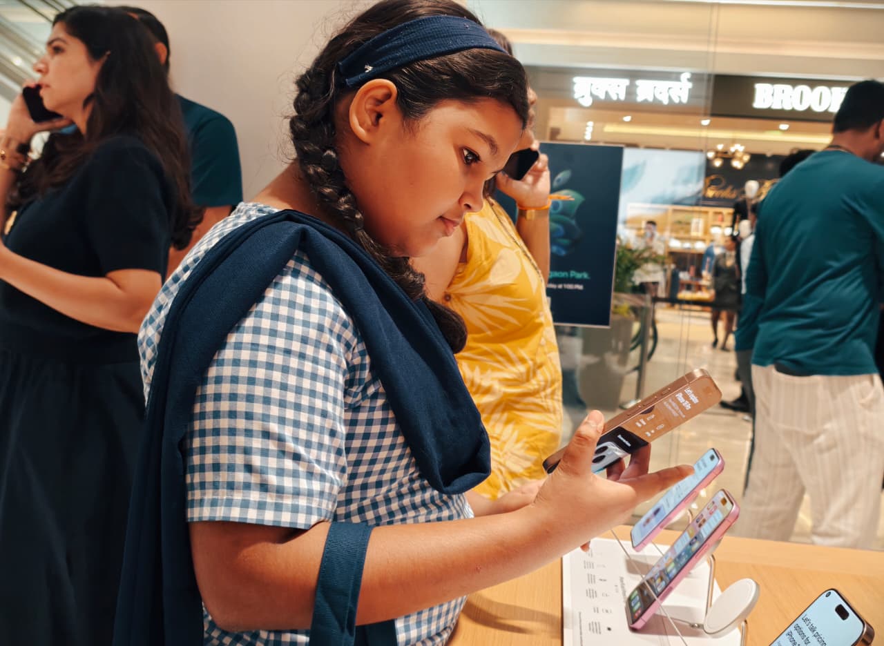 A school student checks out the iPhone 16 mobile phone. (Shaurya Sharma) A school student checks out the iPhone 16 mobile phone. (Shaurya Sharma)