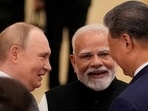 FILE PHOTO: Prime Minister Narendra Modi talks with Russian President Vladimir Putin and Chinese President Xi Jinping ahead of the Shanghai Cooperation Organization (SCO) Summit 2025 in Tianjin, China, on Sept 1 (via REUTERS) FILE PHOTO: Prime Minister Narendra Modi talks with Russian President Vladimir Putin and Chinese President Xi Jinping ahead of the Shanghai Cooperation Organization (SCO) Summit 2025 in Tianjin, China, on Sept 1 (via REUTERS)
