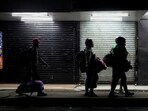 Venezuelan and Haitians migrants, who decided to return to return to South America after spending months in Mexico, following the new U.S. immigration policies under President Donald Trump, cross the border, in Paso Canoa, Costa Rica,