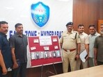 The Hyderabad police with the mobile phones seized from the drug peddlers, who were arrested on Friday. (HT PHOTO) The Hyderabad police with the mobile phones seized from the drug peddlers, who were arrested on Friday. (HT PHOTO)