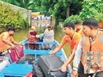 The Yamuna’s rising waters forced people in several parts of the city to evacuate their homes. (HT PHOTO) The Yamuna’s rising waters forced people in several parts of the city to evacuate their homes. (HT PHOTO)