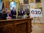 Miami Mayor Francis Suarez speaks next to a sign with a logo for the G20 summit 2026, as U.S. President Donald Trump and U.S. Secretary of the Treasury Scott Bessent listen, in the Oval Office, at the White House in Washington, D.C., U.S., September 5, 2025. 