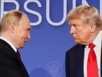 US President Donald Trump and Russian President Vladimir Putin look at each other during a press conference following their meeting to negotiate an end to the war in Ukraine in Anchorage, Alaska, on August 15, 2025.