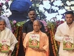 Uttar Pradesh chief minister Yogi Adityanath, along with ministers Gulab Devi and Sandeep Singh, at a Teachers’ Day event in Lucknow on Friday. (PTI PHOTO) Uttar Pradesh chief minister Yogi Adityanath, along with ministers Gulab Devi and Sandeep Singh, at a Teachers’ Day event in Lucknow on Friday. (PTI PHOTO)