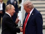 US President Donald Trump shakes hands with Russian President Vladimir Putin during their Alaska meeting.