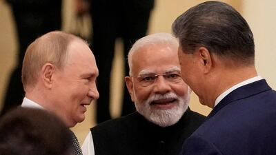 FILE PHOTO: Prime Minister Narendra Modi talks with Russian President Vladimir Putin and Chinese President Xi Jinping ahead of the Shanghai Cooperation Organization (SCO) Summit 2025 in Tianjin, China, on Sept 1 (via REUTERS) FILE PHOTO: Prime Minister Narendra Modi talks with Russian President Vladimir Putin and Chinese President Xi Jinping ahead of the Shanghai Cooperation Organization (SCO) Summit 2025 in Tianjin, China, on Sept 1 (via REUTERS)