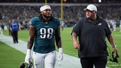 Philadelphia Eagles defensive tackle Jalen Carter (98) walks off the field after being disqualified (AP) Philadelphia Eagles defensive tackle Jalen Carter (98) walks off the field after being disqualified (AP)