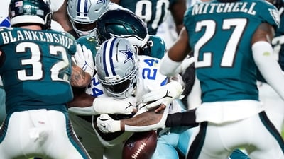 Dallas Cowboys running back Miles Sanders fumbles the ball in as Philadelphia Eagles' Reed Blankenship (32) and Quinyon Mitchell (27) look (AP) Dallas Cowboys running back Miles Sanders fumbles the ball in as Philadelphia Eagles' Reed Blankenship (32) and Quinyon Mitchell (27) look (AP)