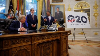 Miami Mayor Francis Suarez speaks next to a sign with a logo for the G20 summit 2026, as U.S. President Donald Trump and U.S. Secretary of the Treasury Scott Bessent listen, in the Oval Office, at the White House in Washington, D.C., U.S., September 5, 2025. (REUTERS)