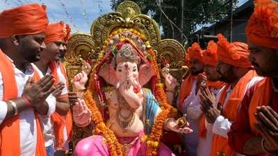 Devotees carry an idol of the Hindu deity Ganesha for immersion in a river after 'Ganesh Chaturthi' festival in Amritsar. (AFP) Devotees carry an idol of the Hindu deity Ganesha for immersion in a river after 'Ganesh Chaturthi' festival in Amritsar. (AFP)