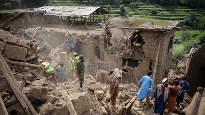 Rescue workers clear debris of a damaged house after a deadly magnitude-6 earthquake that struck Afghanistan (REUTERS)