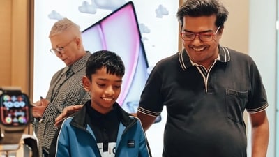 A father explores the latest Apple Watch lineup with his son at the new Apple Koregaon Store in Pune. (Shaurya Sharma - HT) A father explores the latest Apple Watch lineup with his son at the new Apple Koregaon Store in Pune. (Shaurya Sharma - HT)