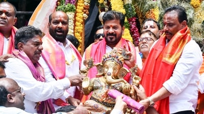 In Punjab's Amritsar, devotees celebrate in the rain as they carry idols of Lord Ganesha for immersion in a canal during the Ganesh Chaturthi festival. (ANI) In Punjab's Amritsar, devotees celebrate in the rain as they carry idols of Lord Ganesha for immersion in a canal during the Ganesh Chaturthi festival. (ANI)