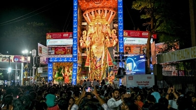 Devotees gather in front of an idol of Lord Ganesha to offer prayers on the occasion of the Ganesh Chaturthi festival in Hyderabad. (AFP) Devotees gather in front of an idol of Lord Ganesha to offer prayers on the occasion of the Ganesh Chaturthi festival in Hyderabad. (AFP)