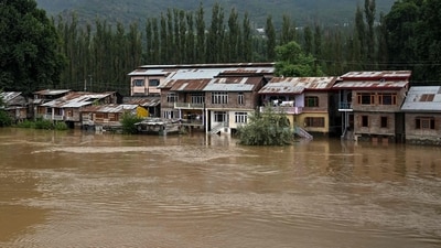 Partially submerged houses are pictured along the banks of the river Jhelum following heavy rains in Srinagar. (AFP) Partially submerged houses are pictured along the banks of the river Jhelum following heavy rains in Srinagar. (AFP)