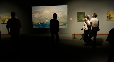 People visit an exhibition called "In Women's Word" showing some artworks of modern Iranian women artists from the collection of the Tehran Museum of Contemporary Art, Iran, Sunday, Aug. 3, 2025. (AP) People visit an exhibition called "In Women's Word" showing some artworks of modern Iranian women artists from the collection of the Tehran Museum of Contemporary Art, Iran, Sunday, Aug. 3, 2025. (AP)