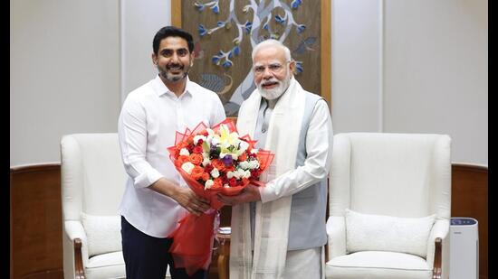 Andhra Pradesh minister for information technology Nara Lokesh meets Prime Minister Modi in New Delhi on Friday. (HT PHOTO)