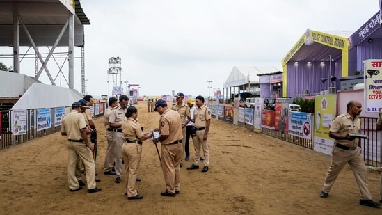 Mumbai: Police personnel keep vigil as part of crowd control measures for the immersion of Lord Ganesh idols as the Ganesh Chaturthi festival concludes, at Girgaon Chowpatty, in Mumbai. (PTI Photo/Kunal Patil) (PTI)