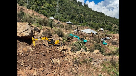 Restoration work underway on Jammu-Srinagar NH, in Udhampur, on Friday. (ANI)