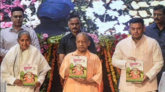 Uttar Pradesh chief minister Yogi Adityanath, along with ministers Gulab Devi and Sandeep Singh, at a Teachers’ Day event in Lucknow on Friday. (PTI PHOTO)
