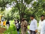 A bulldozer in action at the orchard of SP MLA in Firozabad on Saturday. (HT) A bulldozer in action at the orchard of SP MLA in Firozabad on Saturday. (HT)