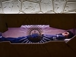 A picture shows the tomb of Blessed Carlo Acutis, an adolescent who spent his life spreading his faith online, earning the moniker "God's Influencer", in the Shrine of the Renunciation in Assisi, part of the Church of Saint Mary Major, on April 3, 2025. A picture shows the tomb of Blessed Carlo Acutis, an adolescent who spent his life spreading his faith online, earning the moniker "God's Influencer", in the Shrine of the Renunciation in Assisi, part of the Church of Saint Mary Major, on April 3, 2025.