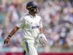 Karun Nair returns to the pavilion after his dismissal on day two of the fifth Test against England. 