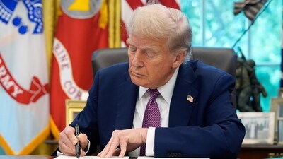 President Donald Trump signs an executive order in the Oval Office of the White House, Friday, Sept. 5, 2025, in Washington. (AP)